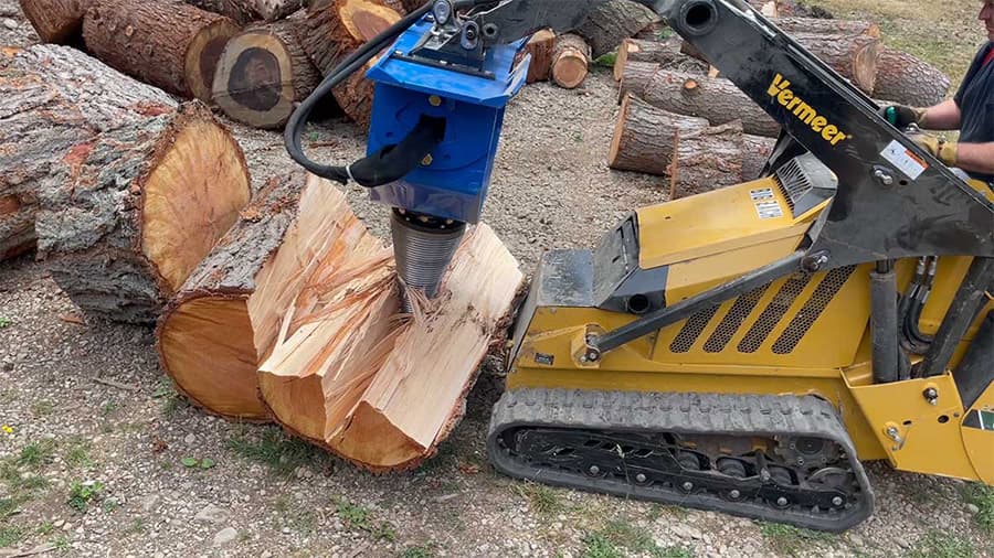 HF-300 cone splitter on a Vermeer mini skid steer